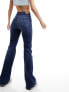 Фото #2 товара Tommy Jeans sylvia high waist flared jeans in mid wash