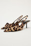 Animal print slingback shoes with bow