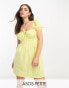 Фото #1 товара ASOS DESIGN Petite broderie short sleeve mini tea dress with ruched bust in lemon