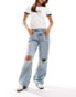 ASOS DESIGN mid rise baggy boyfriend jeans with knee rips in light vintage wash