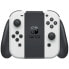 Фото #6 товара Игровая консоль Nintendo Switch OLED модель: новая версия, насыщенные цвета, 7-дюймовый экран - с белым Joy-Con
