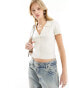 Фото #1 товара ASOS DESIGN button through short sleeve knitted top with collar in cream