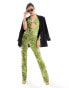 ASOS DESIGN slim leg cut out detail jumpsuit in neon green snake print