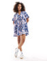 ASOS DESIGN mini shirt dress with revere collar and corset hem in blue abstract print