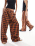 COLLUSION Unisex check wide leg trousers in orange