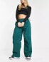 Stradivarius STR oversized parachute pant in bottle green