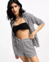 Фото #8 товара The Frolic bromine beach short co-ord in black and white textured gingham