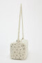Mini bowling bag with faux pearls