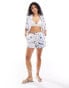 Iisla & Bird printed beach short co-ord in white and blue