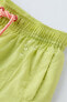 Water-repellent bermuda shorts with contrast drawstrings