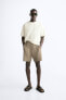 Textured mesh bermuda shorts