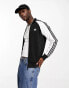 Фото #1 товара adidas Originals Superstar trackjacket in black and white