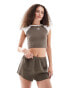 Фото #1 товара Monki waffle texture pull on shorts in khaki