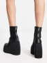 Фото #2 товара Shellys London Roxanne wedge boots in black