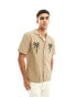 Фото #1 товара River Island palm embroidered shirt in brown