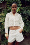 Cropped shirt with cutwork embroidery