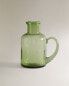 Hammered glass jug