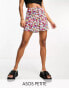 ASOS DESIGN Petite button through mini skirt in ditsy floral