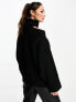 Edited cut-out knitted jumper in black