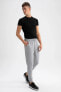 Фото #8 товара Спортивные брюки Defacto Slim Fit с карманами и манжетами