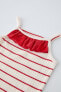 Striped ribbed bodysuit with ruffle
