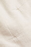 Ruffle-trimmed Bedspread