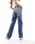 Фото #8 товара Tommy Jeans Betsy jeans in mid wash
