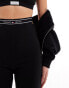 Tommy Jeans logo taping legging shorts in black