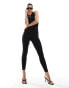 Фото #6 товара In The Style zip through sleevless unitard jumpsuit in black