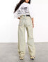 ASOS DESIGN Weekend Collective acid washed extreme rip baggy jean