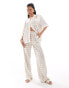 Фото #1 товара The Couture Club co-ord emblem print wide leg trousers in beige