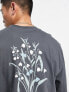 ASOS DESIGN relaxed long sleeve t-shirt with flower back print in charcoal