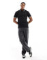 Calvin Klein stretch pique tipped polo in black