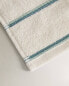 Cotton bath towel with coloured trim