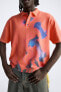 Knit polo shirt with abstract print