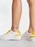 ASOS DESIGN Wide Fit Duet flatform lace up trainers in white/yellow