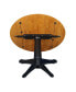 International Concept 42" Round Dual Drop Leaf Pedestal Table