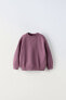 Plush sweatshirt with contrast seams