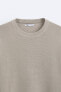 Sweater with mercerised finish