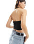 Фото #4 товара Tommy Jeans cropped halter ribbed top in black