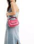 DKNY Arden top handle bag with cross body strap in pink croc