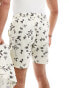 ASOS DESIGN co-ord seersucker swim shorts in beige with black floral print