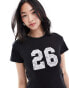 Фото #1 товара ASOS DESIGN baby tee with 26 number lace graphic in black