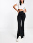 Фото #2 товара Hollister high rise slit flare jeans in black