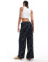 Фото #3 товара ASOS DESIGN Tall wide leg trouser with linen in mono print