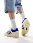 adidas Originals Rivalry Low trainers in white and blue