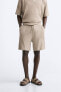 Textured bermuda shorts