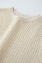 Open-knit vest