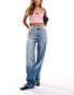 Фото #1 товара Weekday Rail mid waist baggy fit jeans in tide blue wash