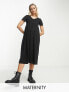 Фото #1 товара Mamalicious Maternity v neck short sleeve midi dress in washed black